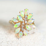 colourful marquise shaped crystal opals set into an ornate 18ct yellow gold ring