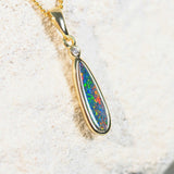 australian opal pendant with a shiny diamante