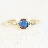 black opal ring in gold