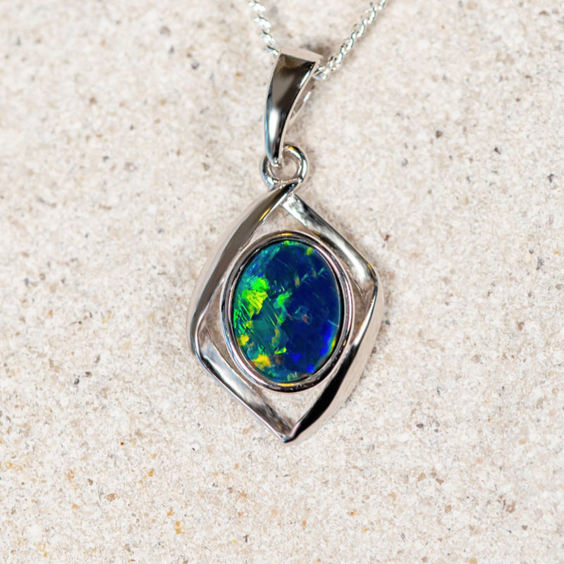 opal pendant in silver set into a nova setting