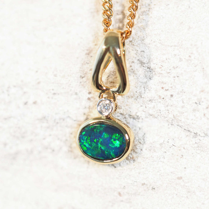 diamond and opal gold pendant