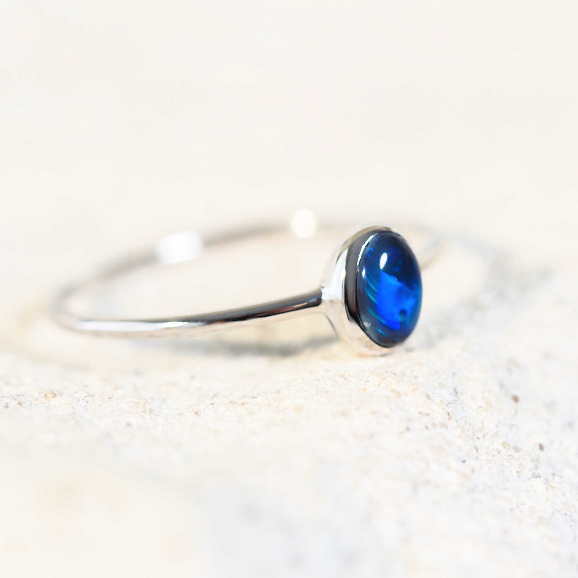 black opal ring set in white gold