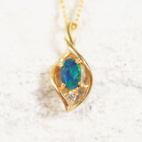 blue and green triplet opal pendant set in gold plated silver