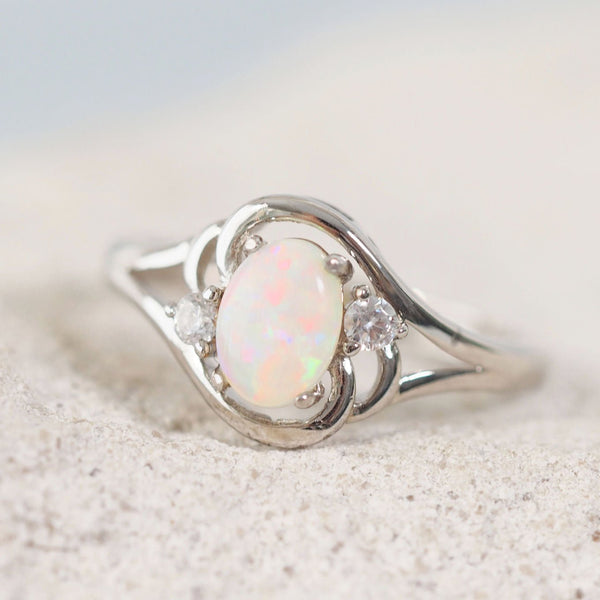 white opal ring set in sterling silver