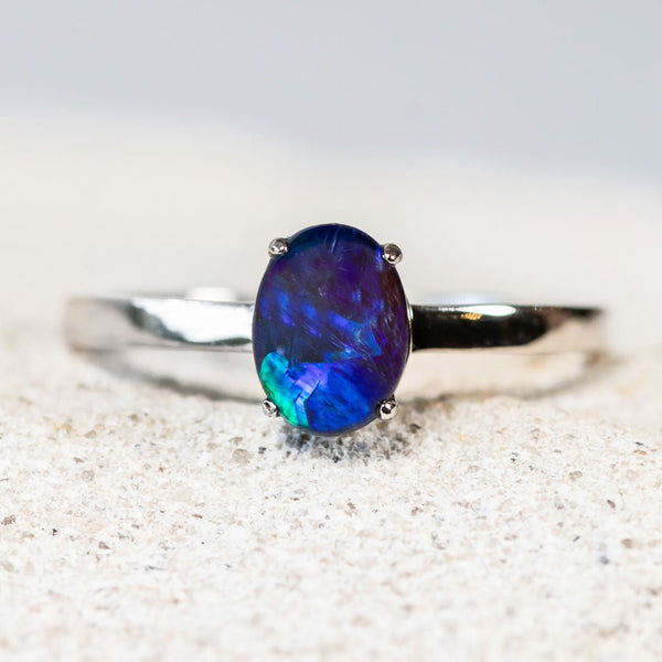 opal ring set in silver with a triplet opal