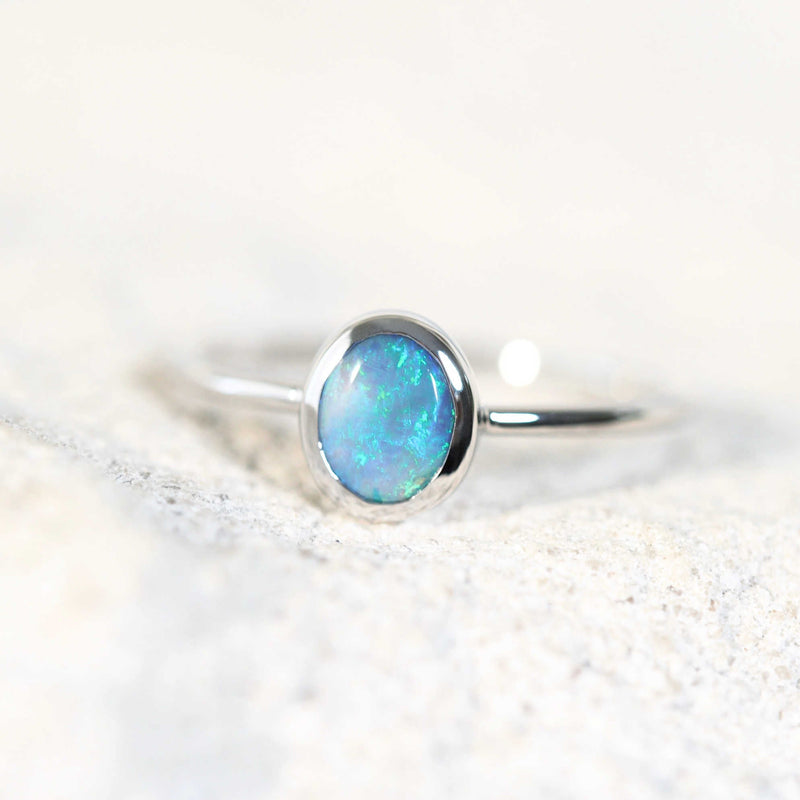 aqua green opal ring set in white gold