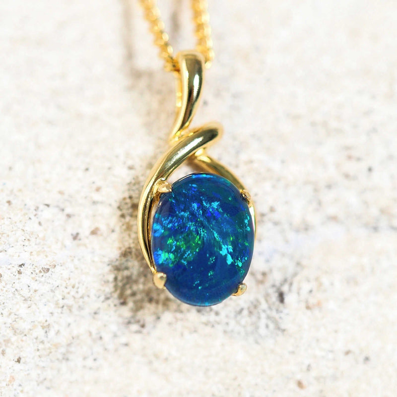 a blue and green-colour opal pendant set in gold plated silver