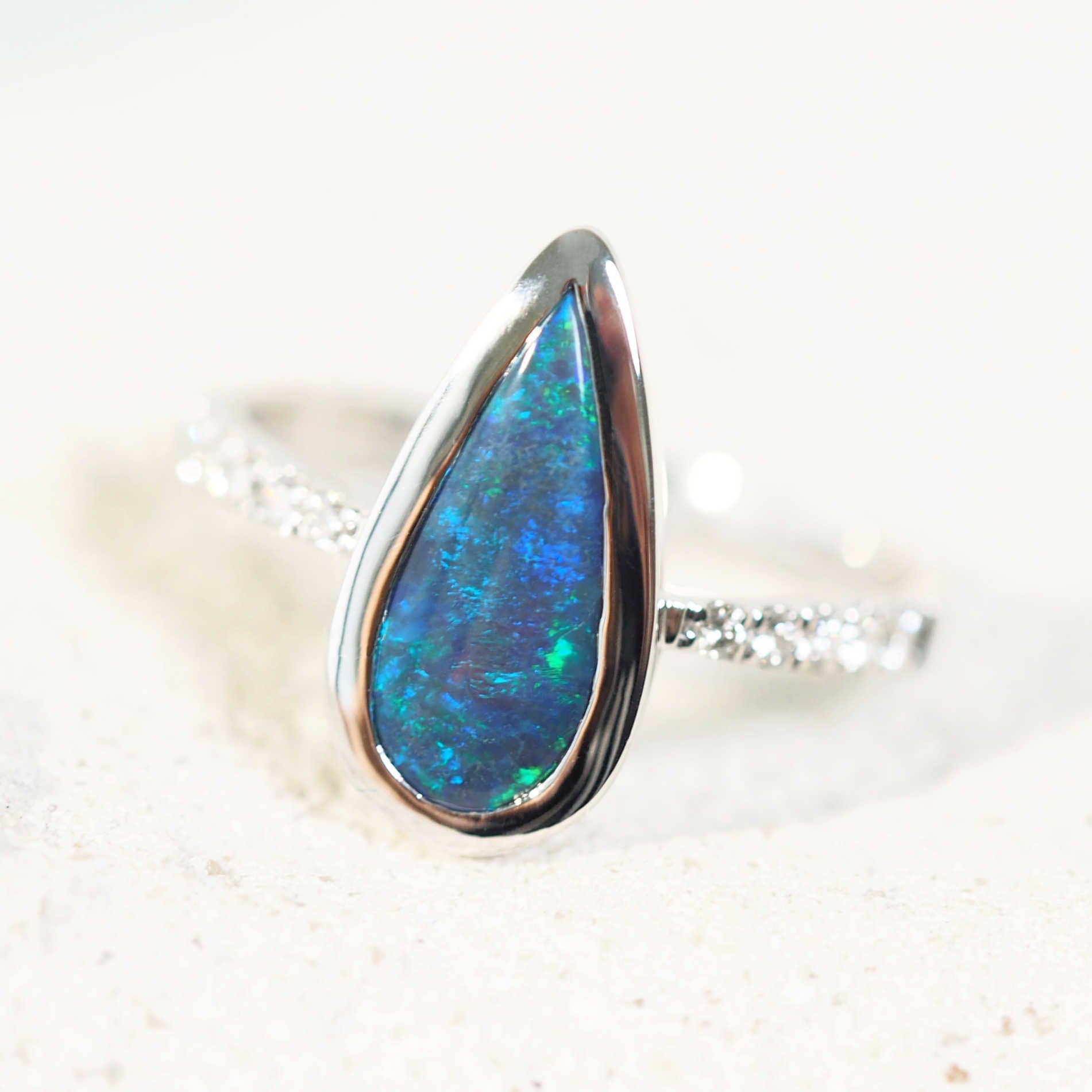 black opal ring set in white gold