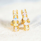 five opal earrings with gold plated silver