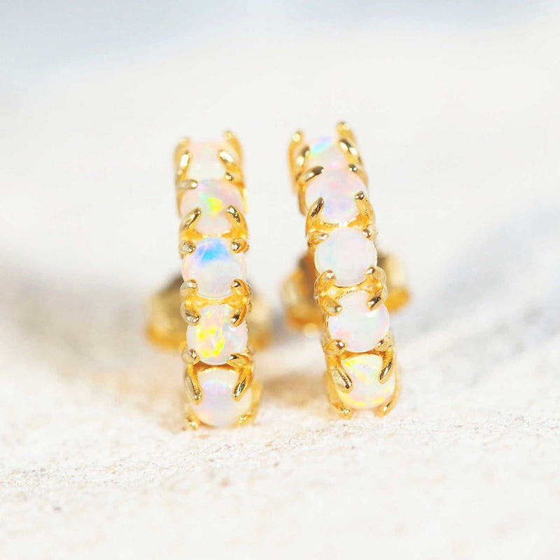 five opal earrings with gold plated silver