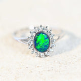 shimmering green opal set into 18ct white gold ring