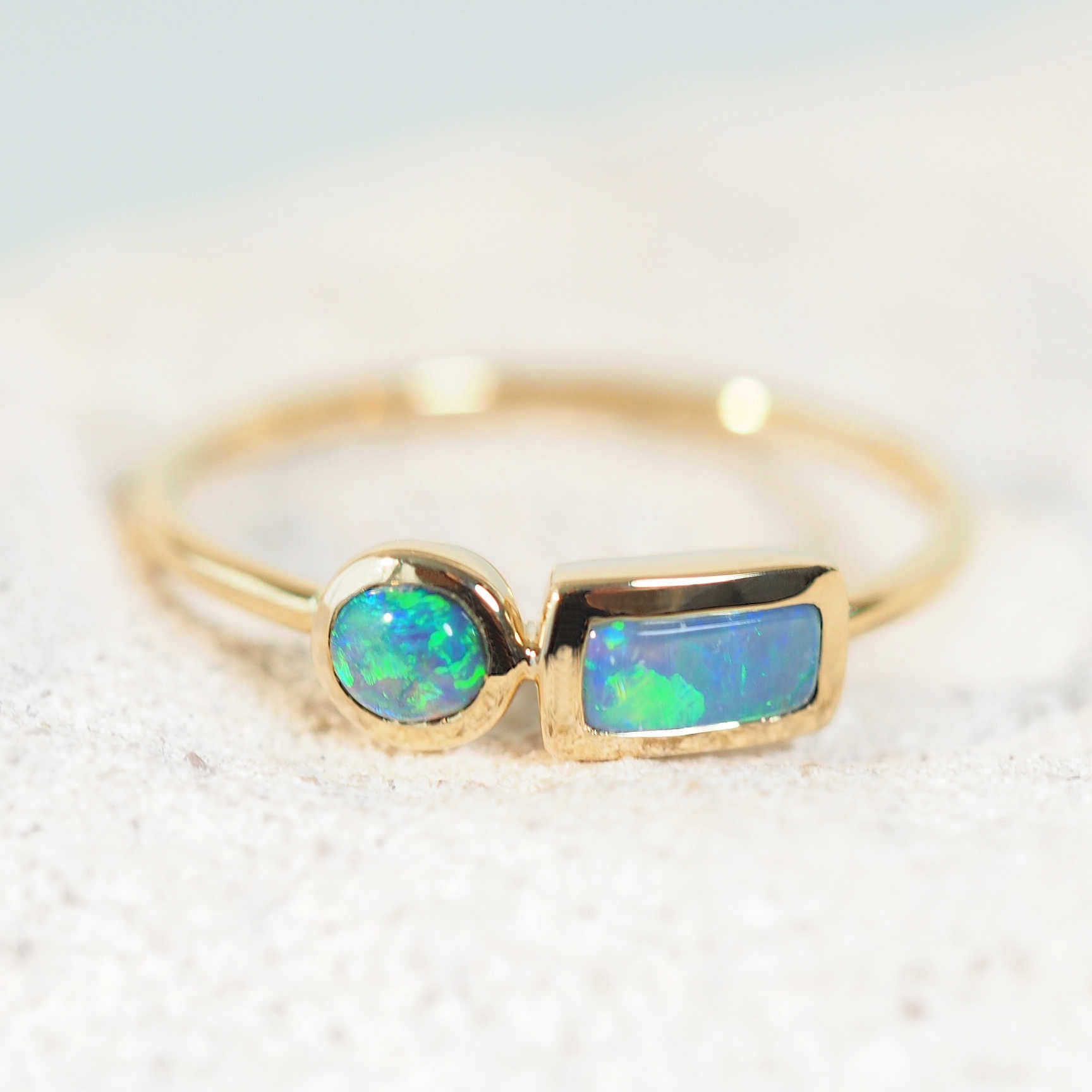 green lightning ridge opal ring set in 14ct yellow gold