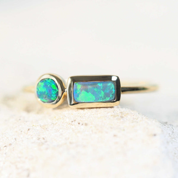 green and blue opal ring set in gold