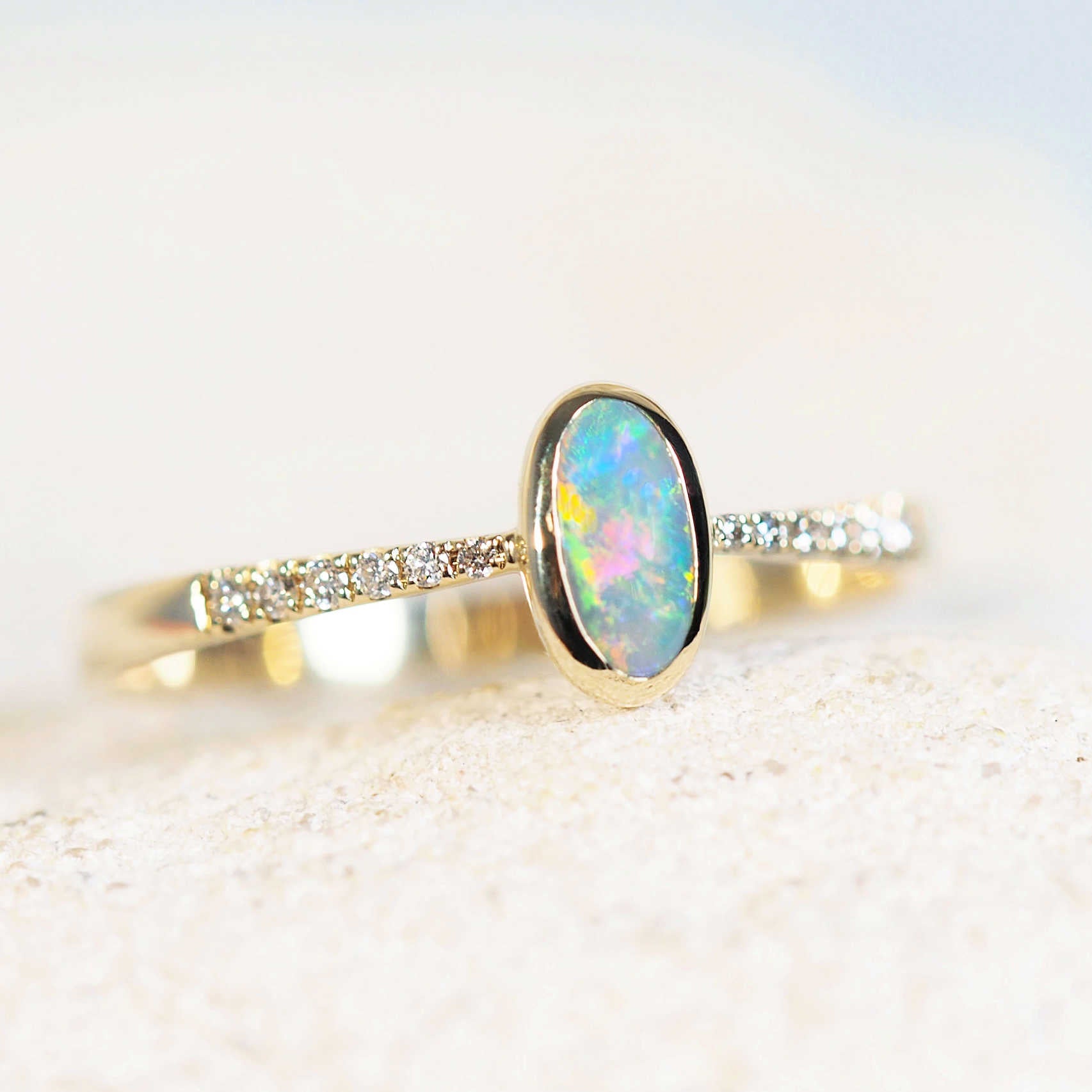 14ct gold semi black opal ring with diamonds