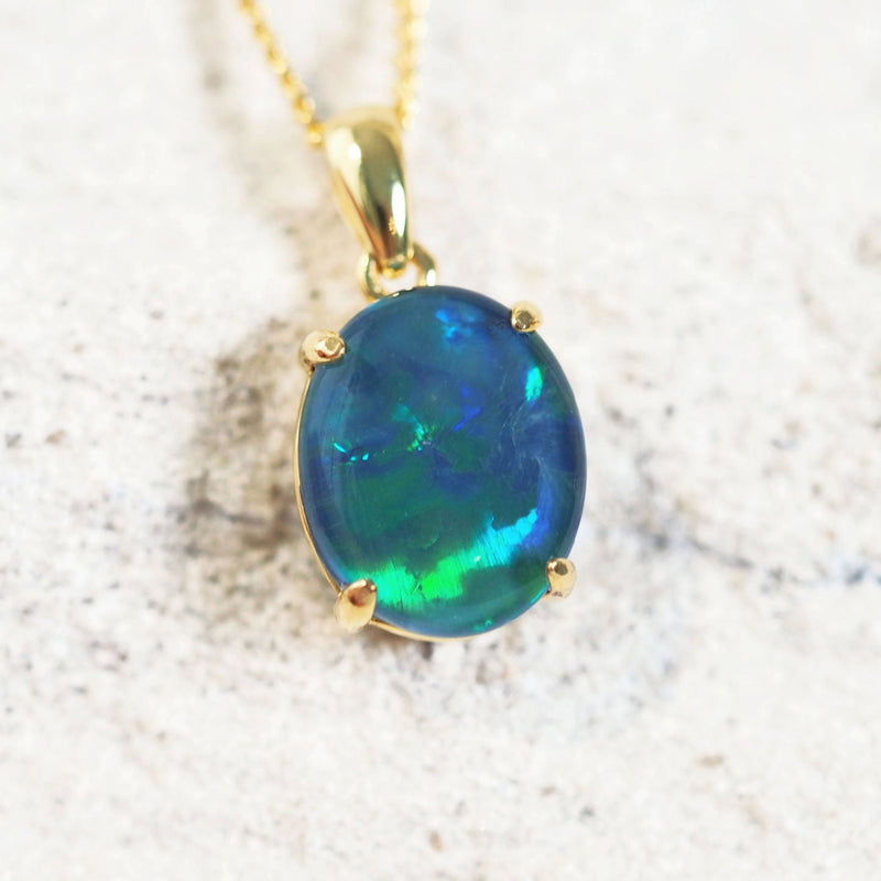 blue and green triplet opal pendant