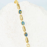 elegant opal bracelet set with a colourful trio of opals in gold plated silver