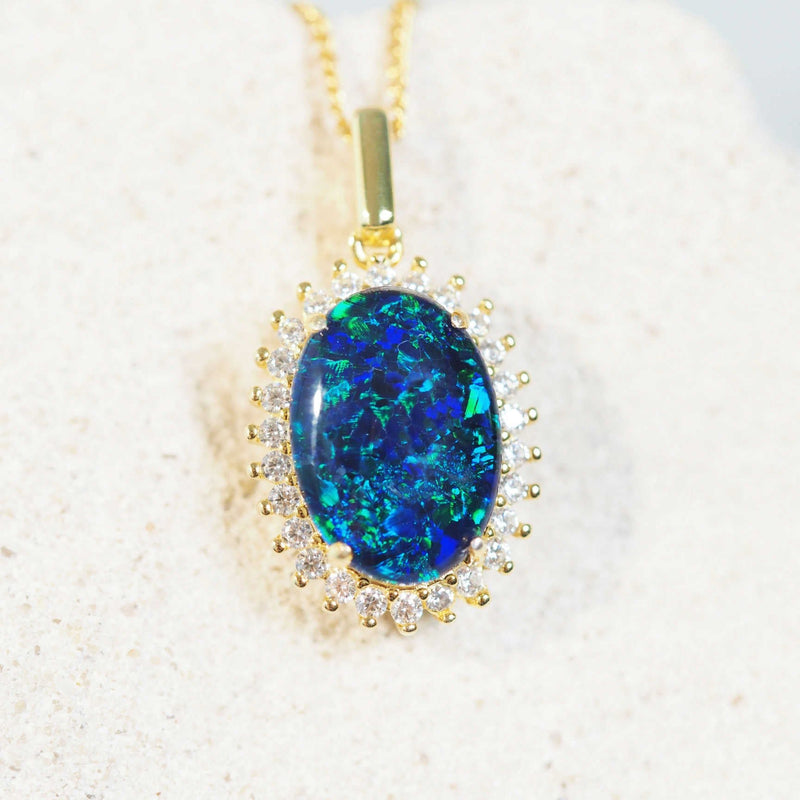 blue and green triplet opal pendant in gold plated silver