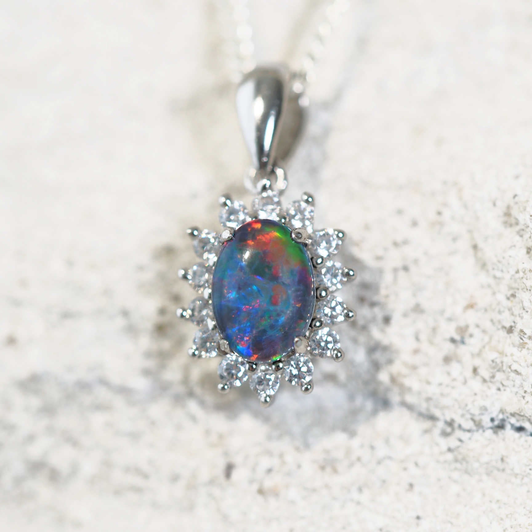 glamorous silver opal pendant with 14 diamantes