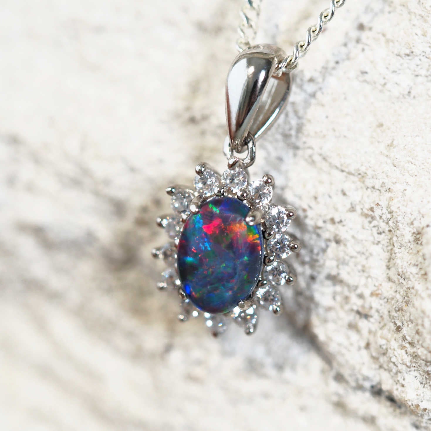 colourful glamorous opal pendant set in silver