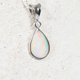 Elegant teardrop-oval opal necklace with diamond accents