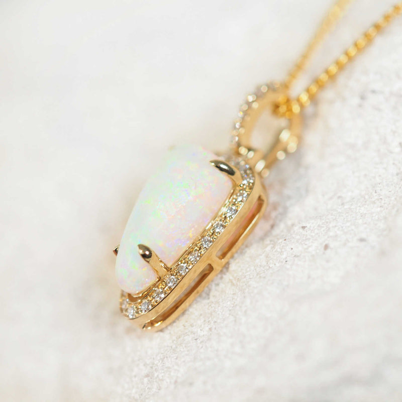 Lightning Ridge crystal opal pendant set in 14ct gold with diamonds