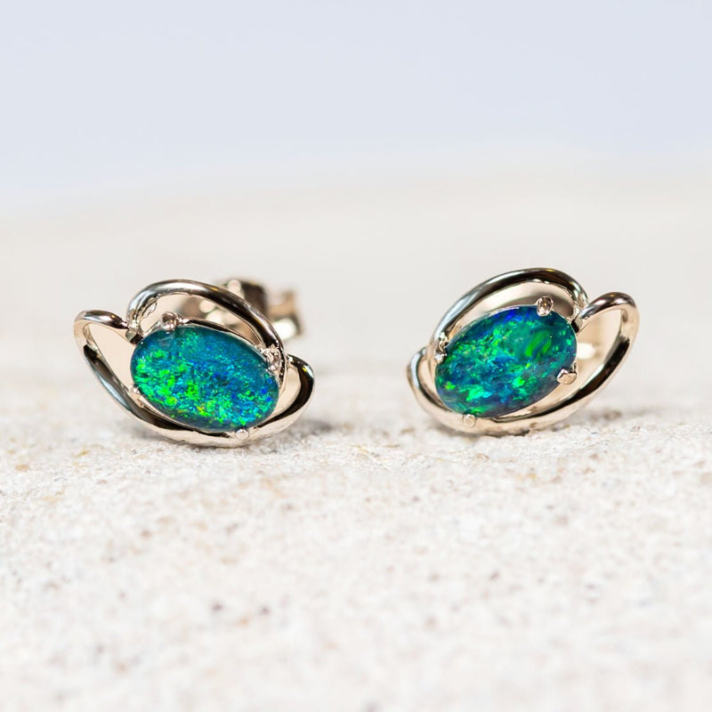 green and blue oval opal earrings set in silver