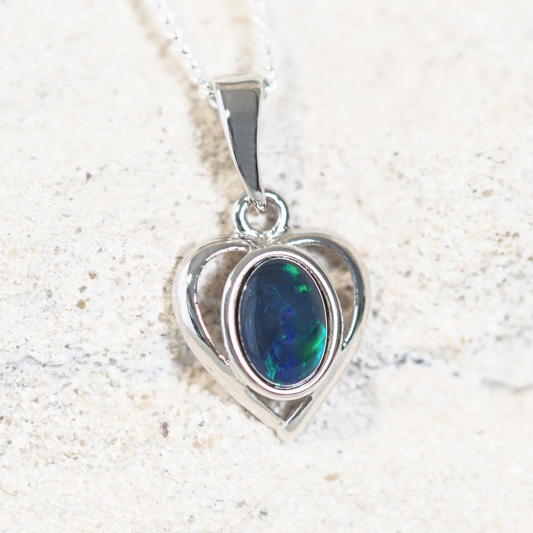 blue and green heart opal pendant