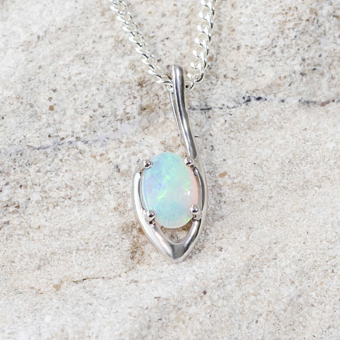 white gold crystal opal pendant