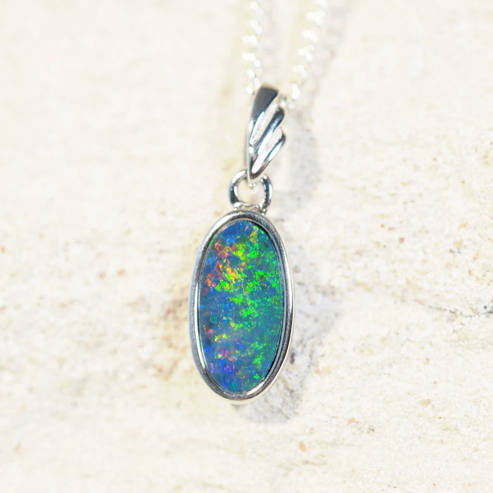 colourful oval opal pendant