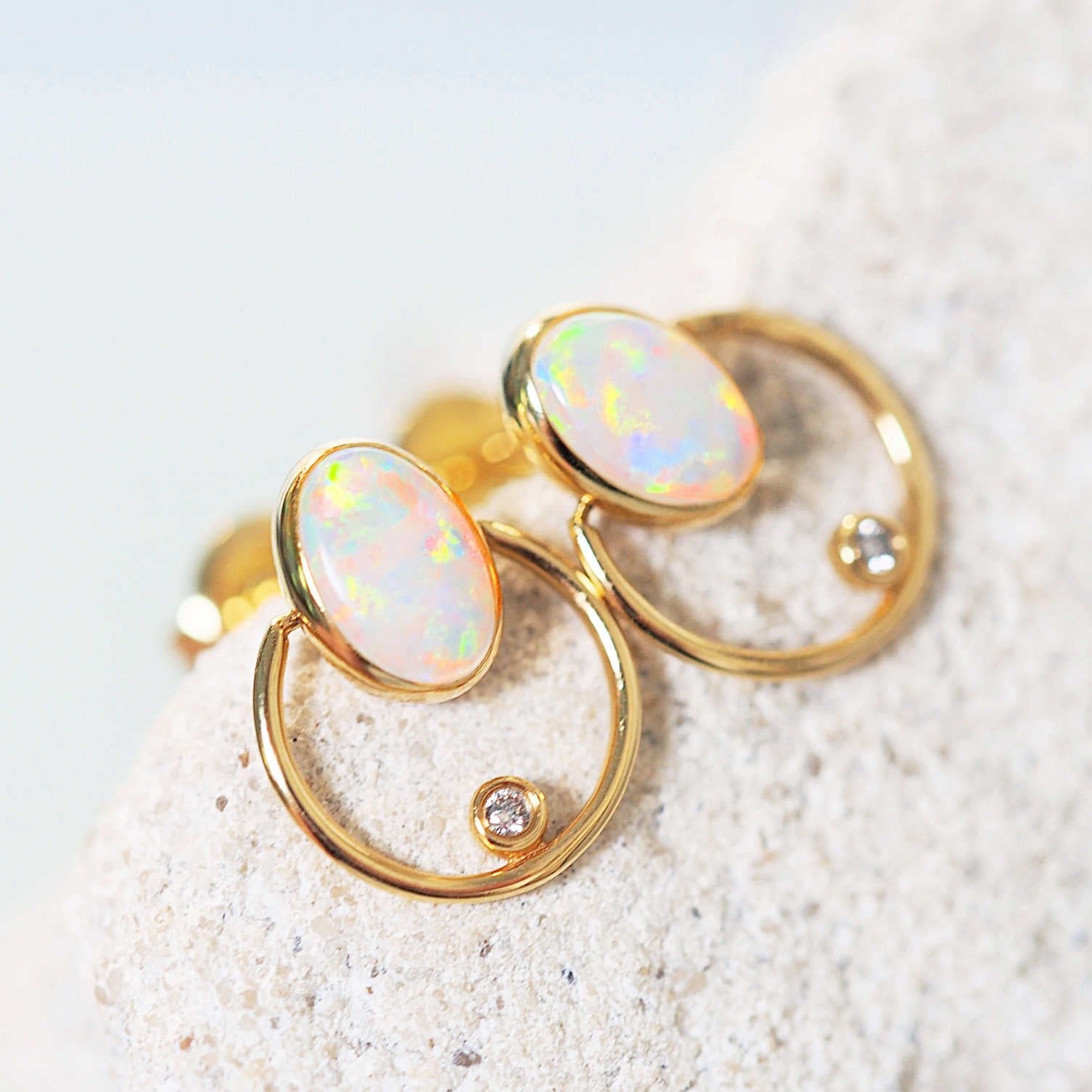 australian opal set in gold earrings