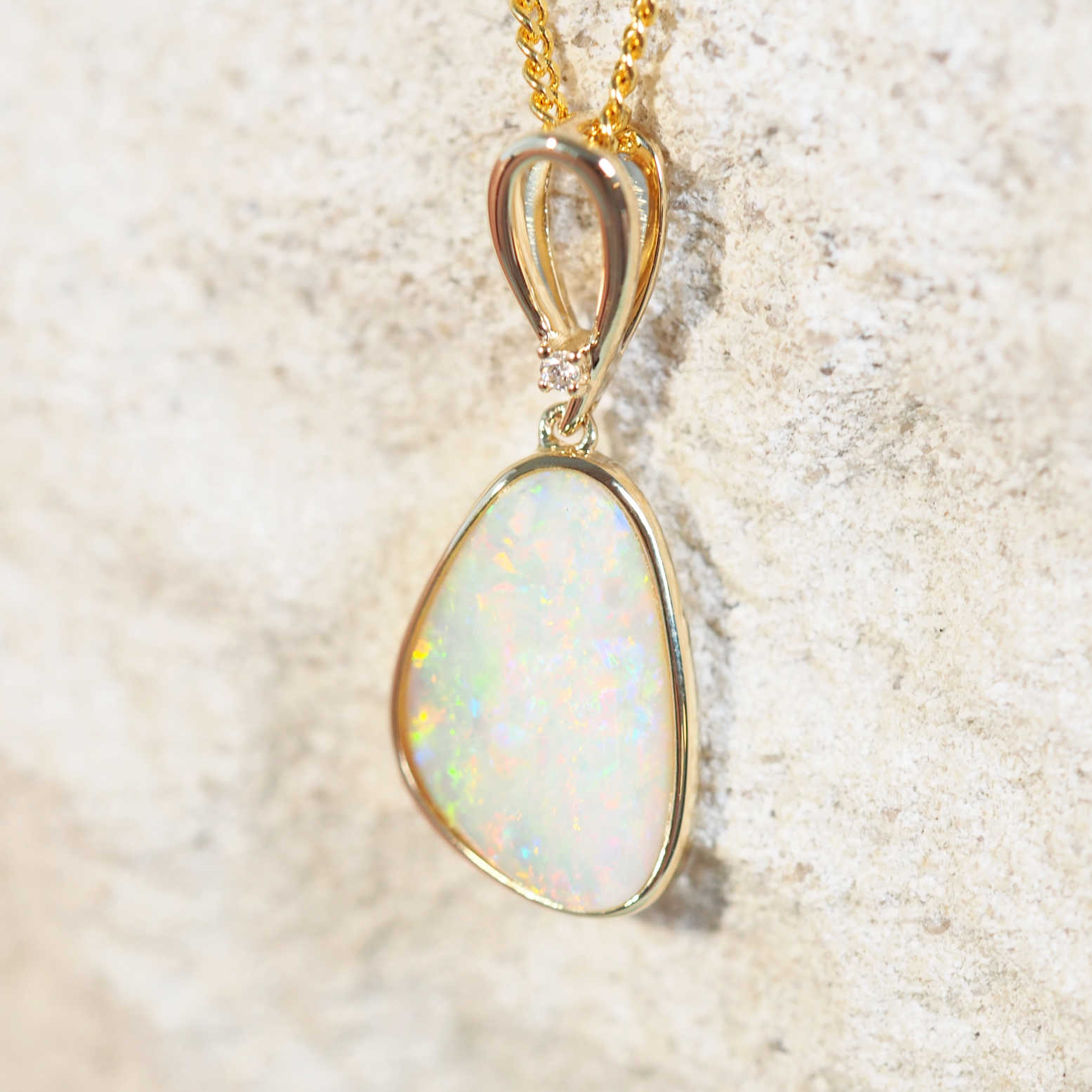 crystal opal gold pendant