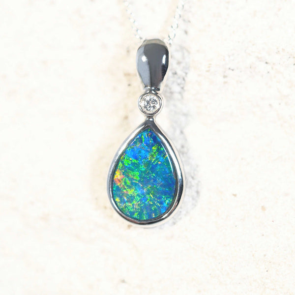 doublet opal white gold pendant with one diamond