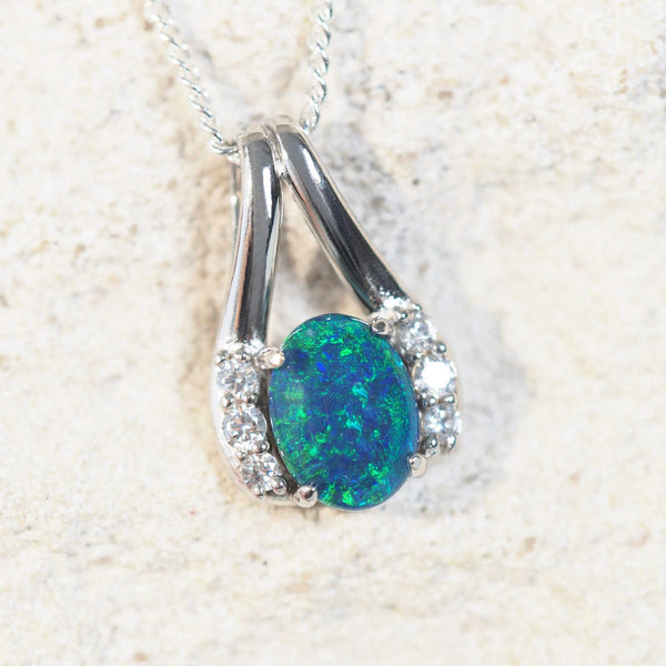 blue opal pendant set in sterling silver with six sparkling diamantes