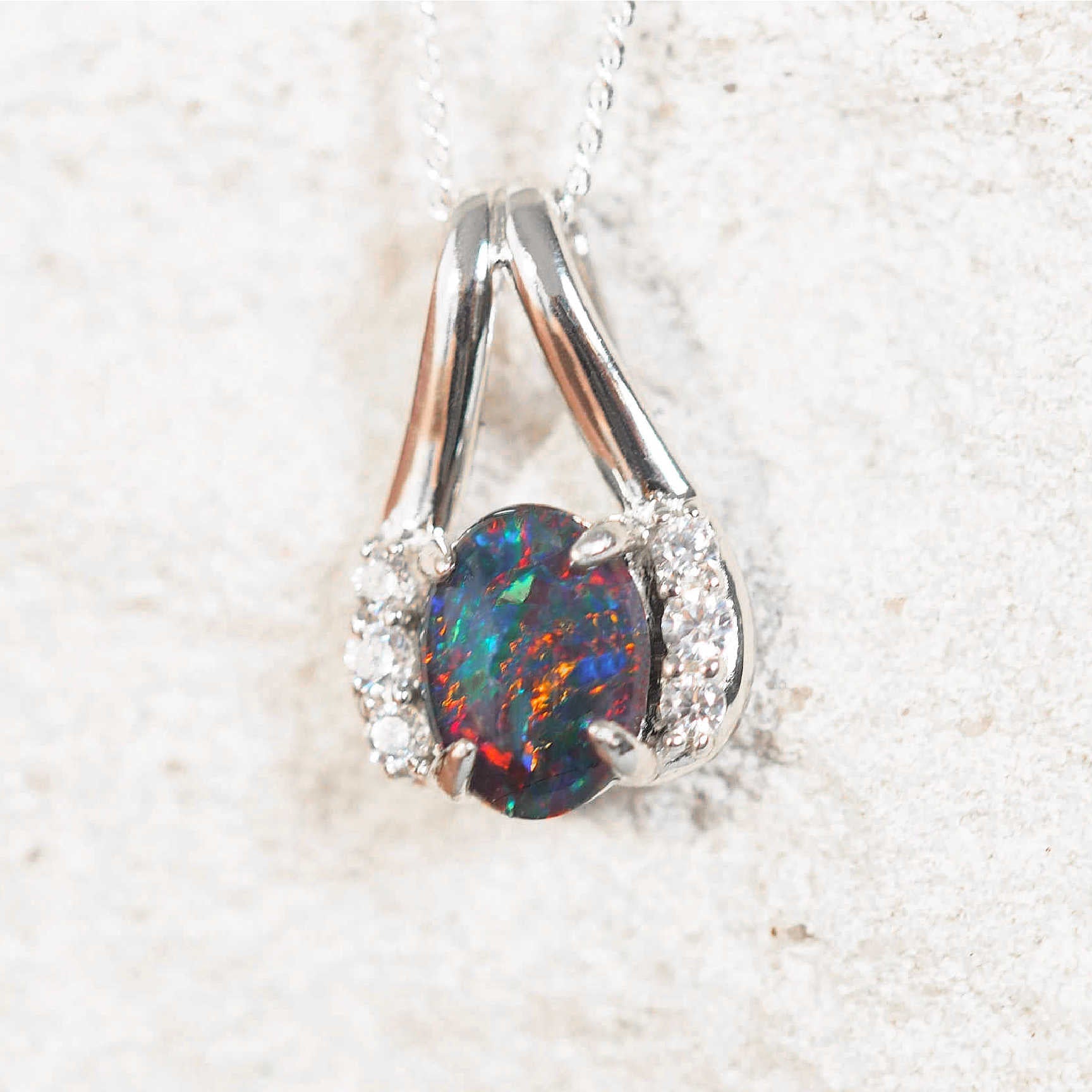 opal pendant with colourful australian opal gemstone and six diamantes set in sterling silver