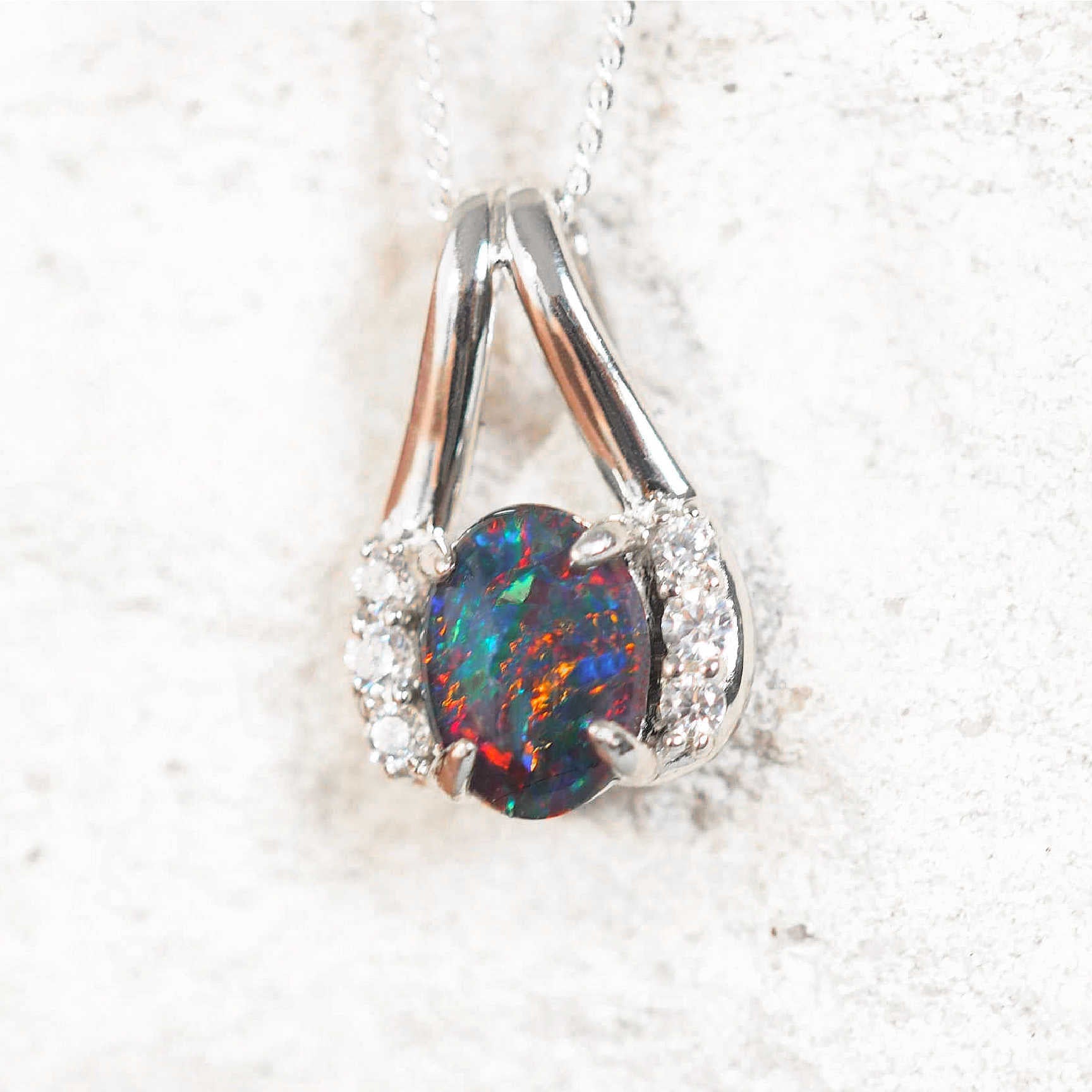 opal pendant with colourful australian opal gemstone and six diamantes set in sterling silver