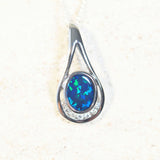 blue and green doublet opal pendant with seven diamonds