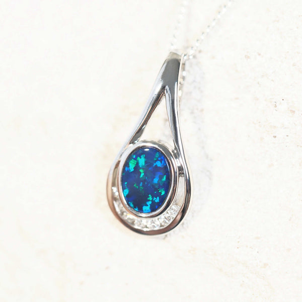 blue and green opal pendant set in white gold