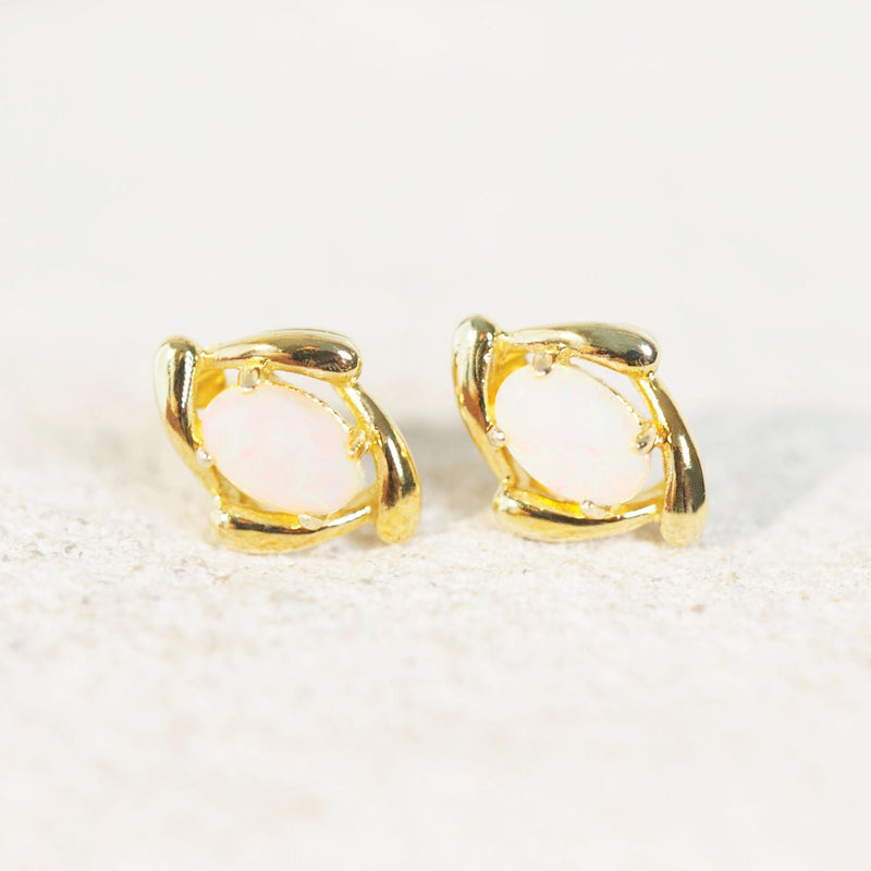 white opal earrings in gold plated silver