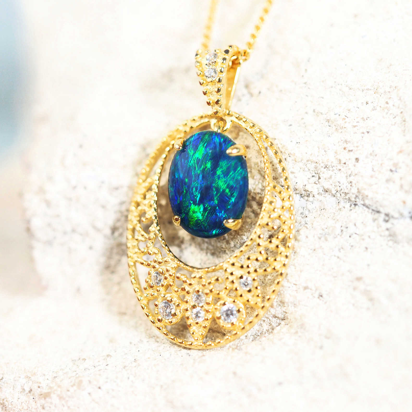 blue opal pendant in gold plated silver