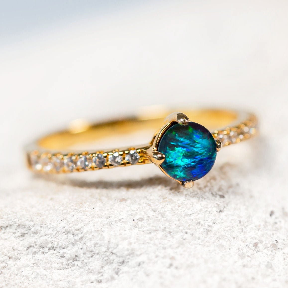 blue and green round opal ring