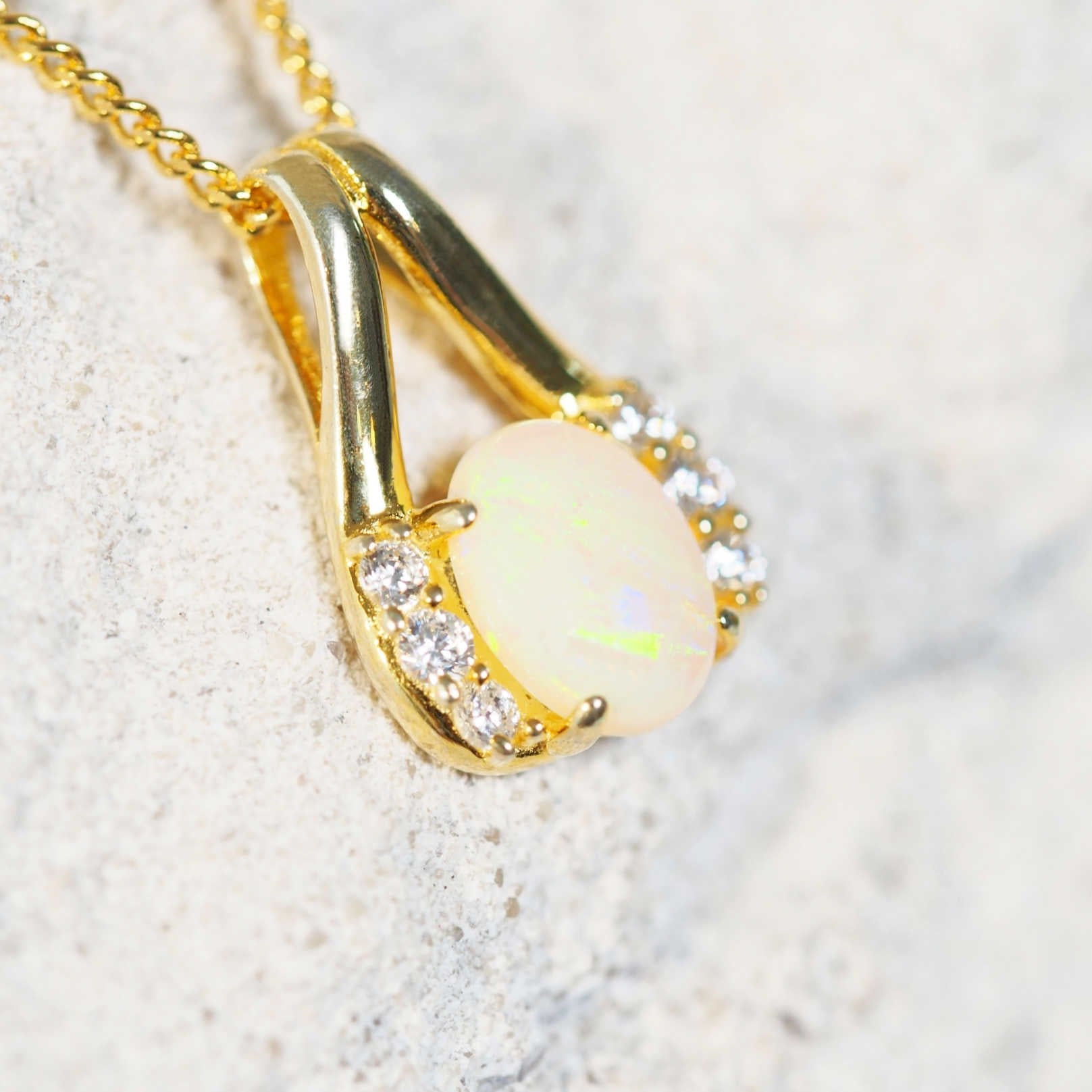 white opal gold plated silver pendant