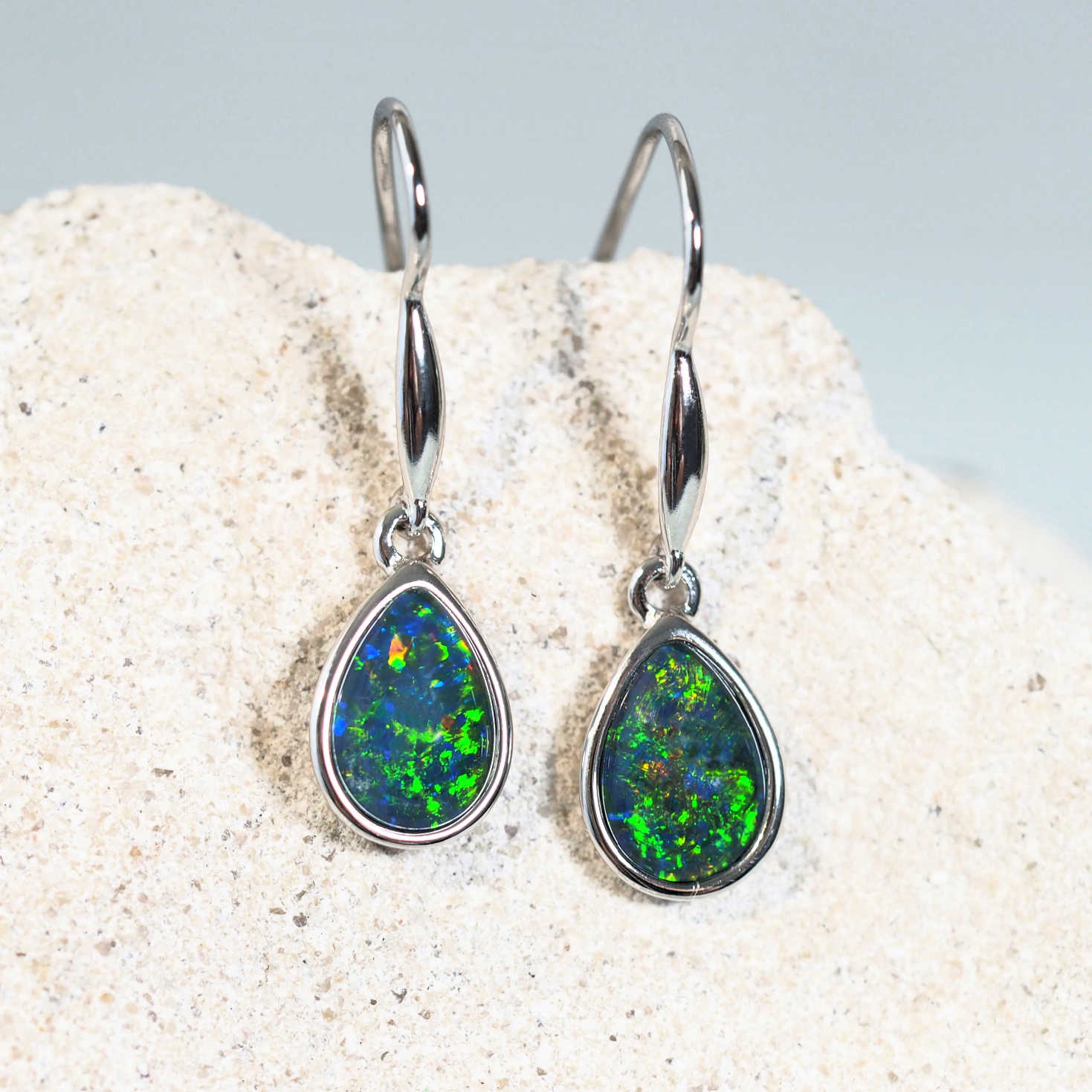 pear shaped opal earrings in silver