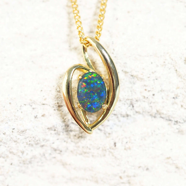 colourful opal pendant set in gold plated silver