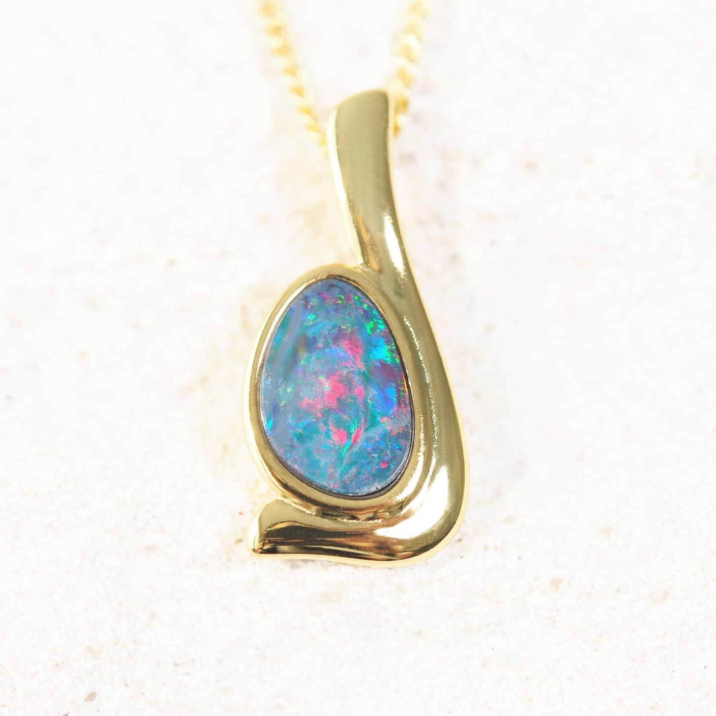 teardrop shaped opal gold plated silver pendant