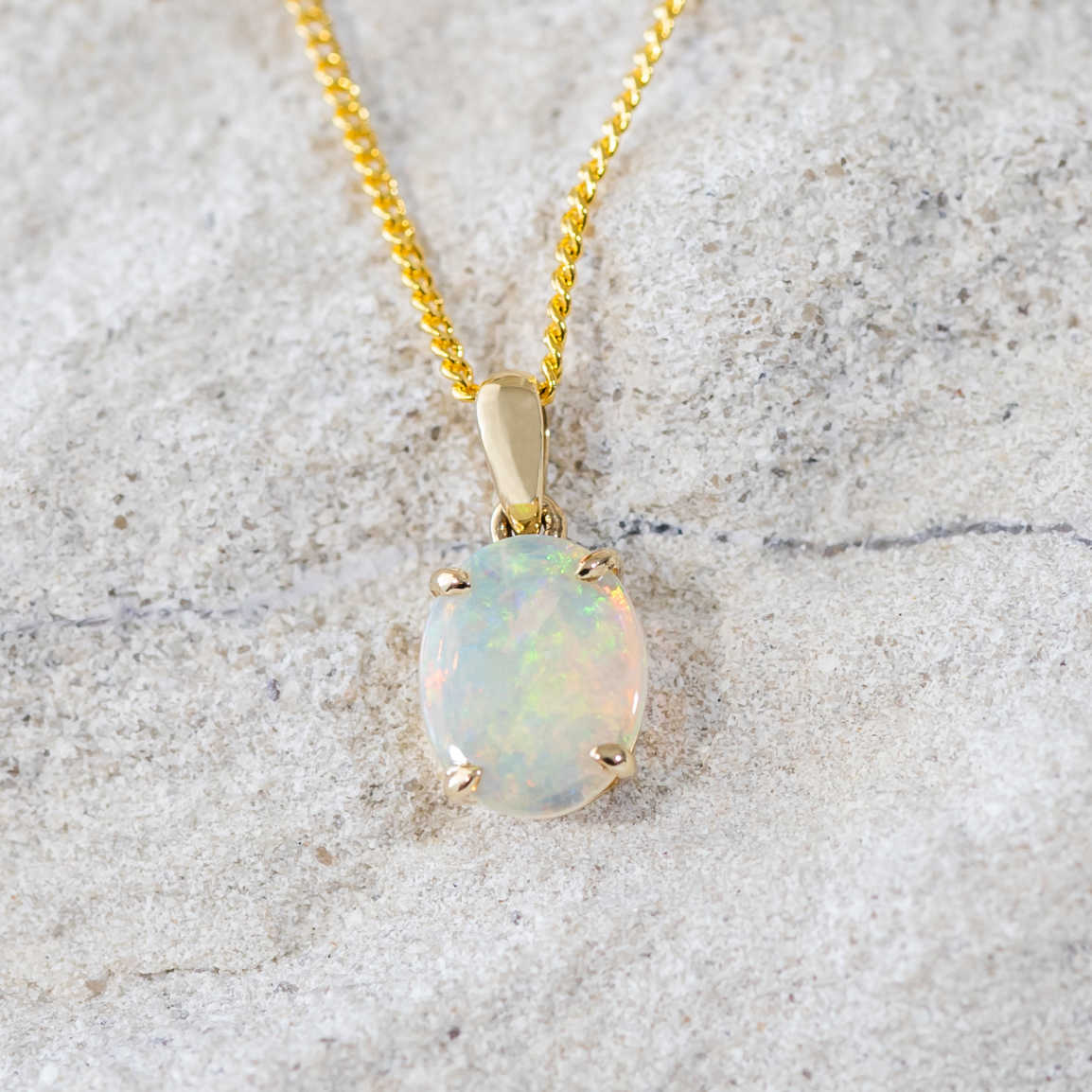 gold crystal opal pendant