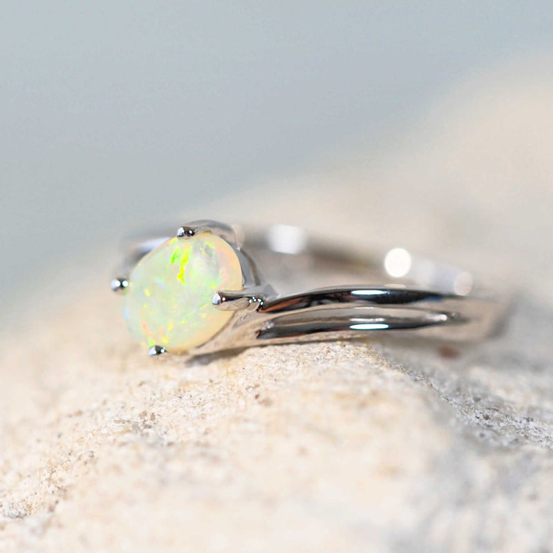 crystal opal ring set in white gold