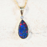 colourful teardrop shape gold opal pendant with one diamond