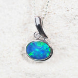 Marina opal pendant in 14ct white gold featuring a blue-and-green Australian doublet opal, oval-shaped and bezel set with a sparkling white diamond accent.