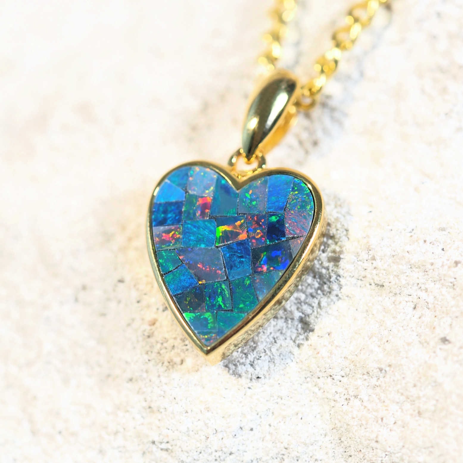 colourful mosaic heart pendant set in gold plated silver