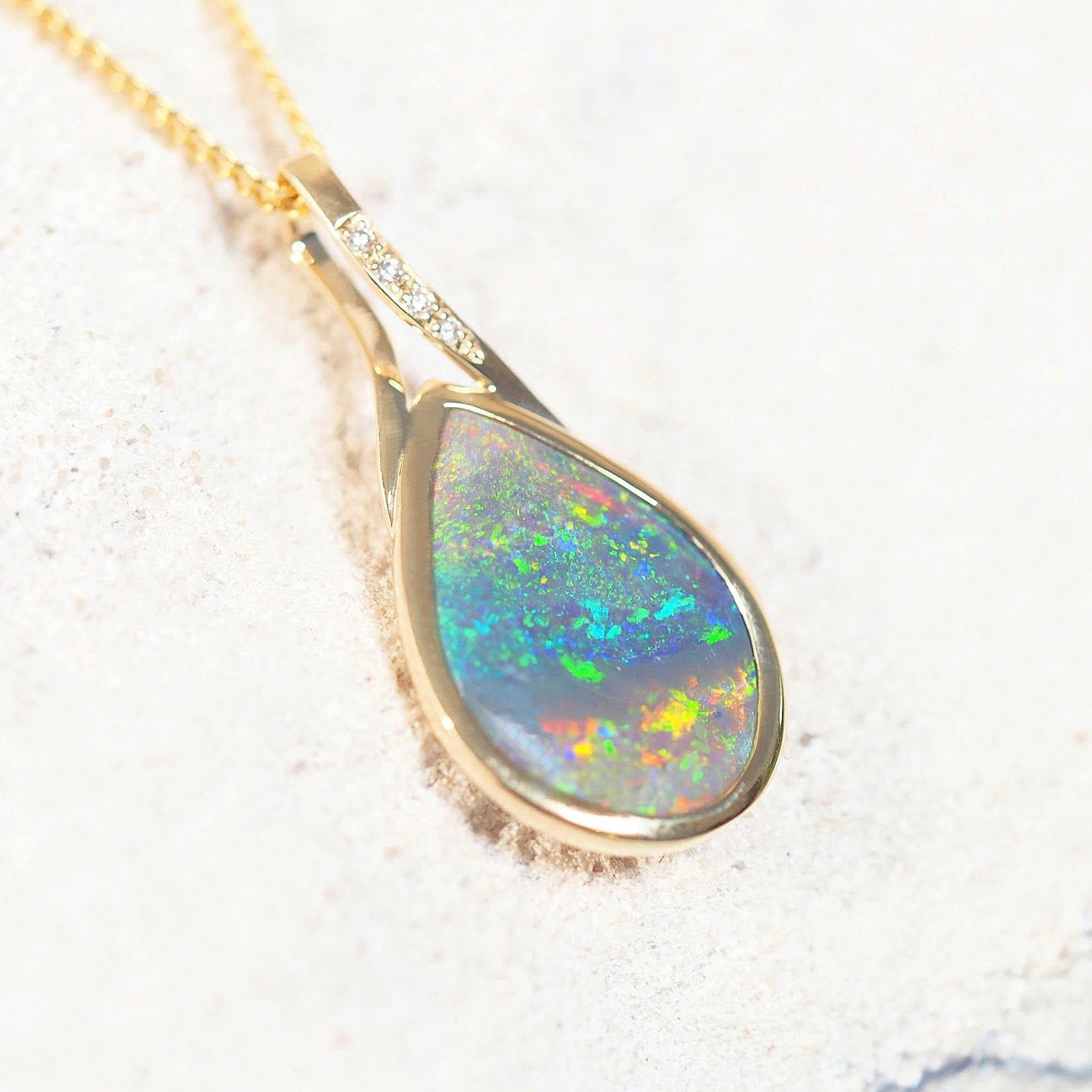 opal pendant black crystal gold